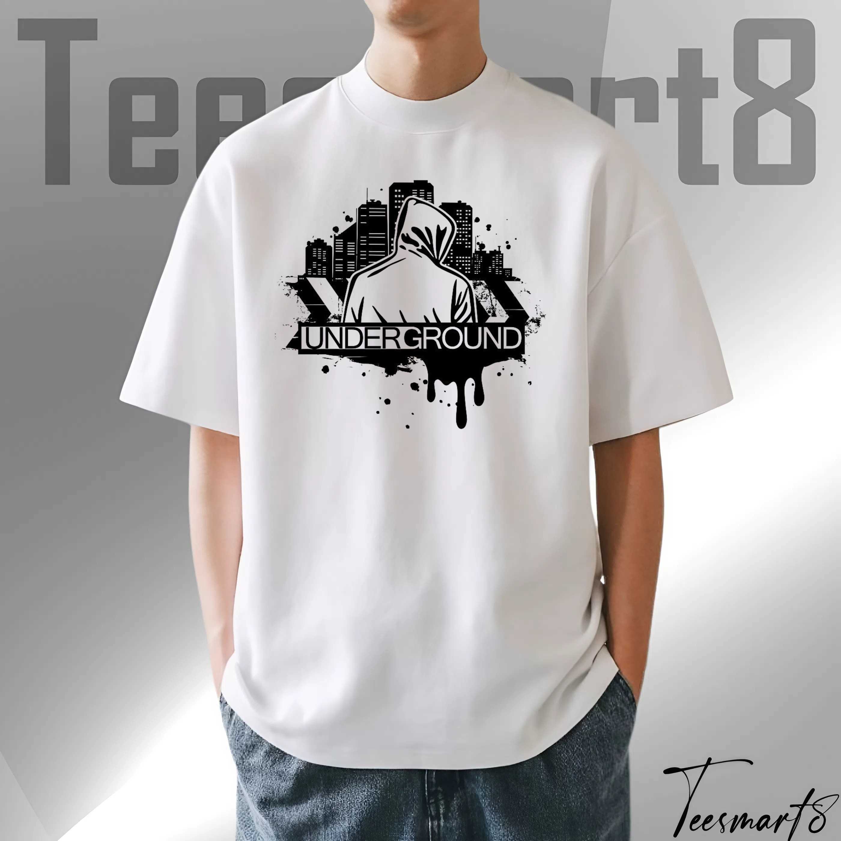 Urban-Style Illustration Of A Man In A Hoodie, Behind A City Silhouette – Street Art Style T-Shirt